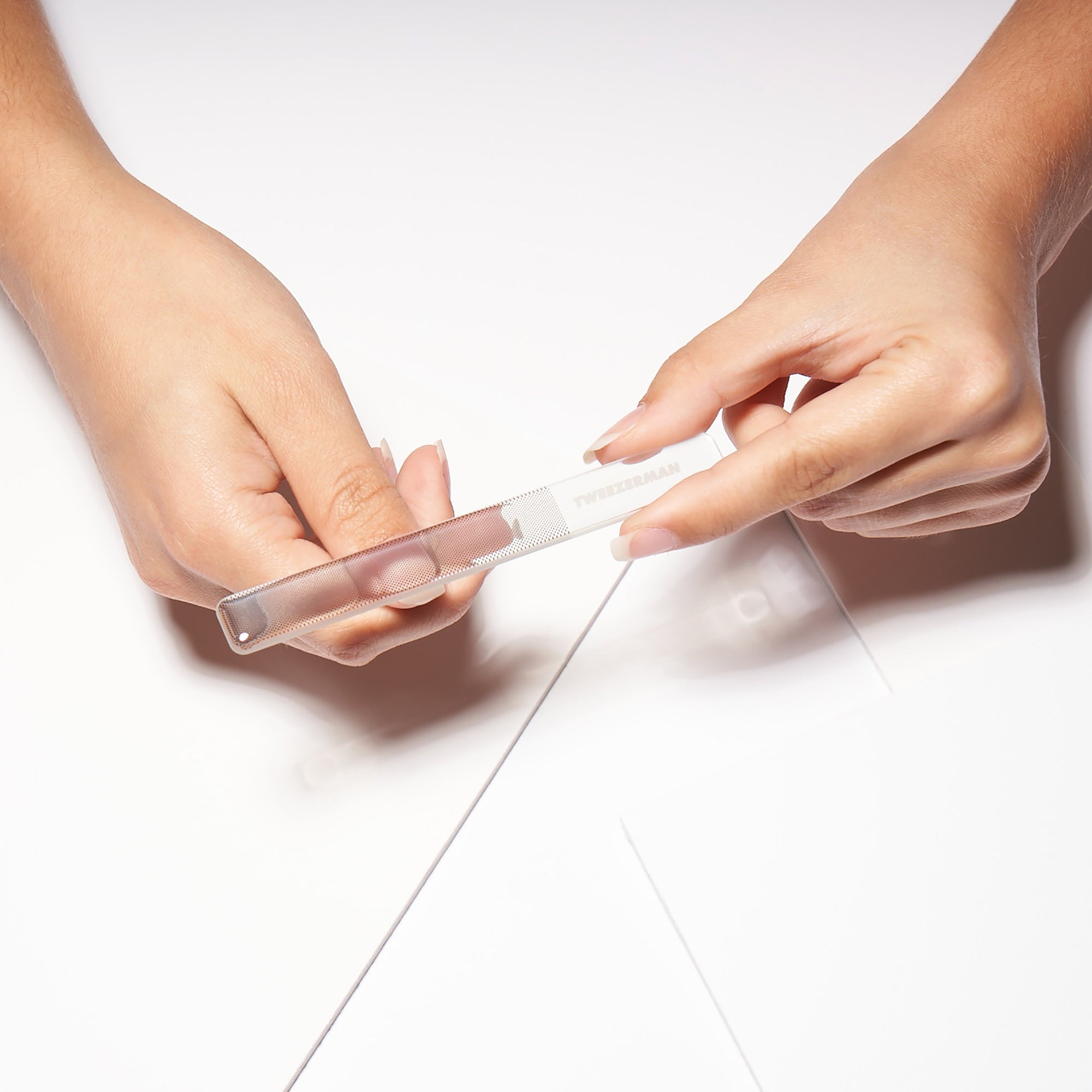 Model using glass nail buffer